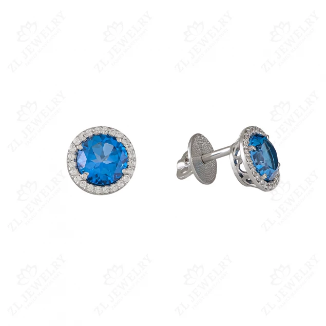White gold studs with topaz