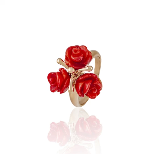 Golden ring with red roses
