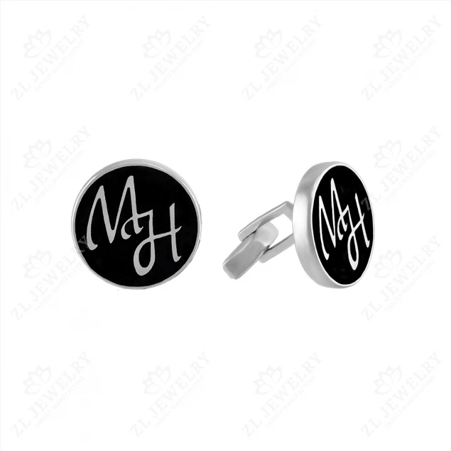 Cufflinks with the initials "M N"