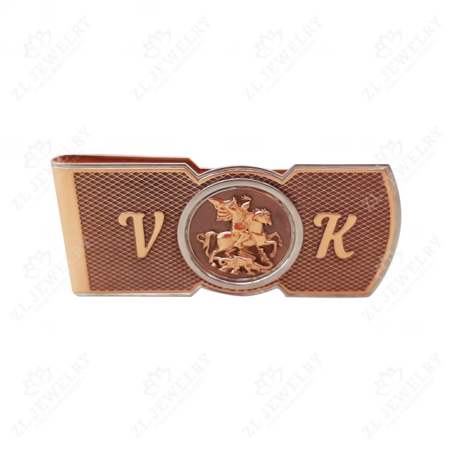 Money clip with initials "VK"