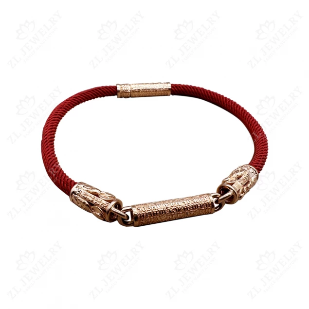 &quot;Our Father&quot; bracelet on a red thread