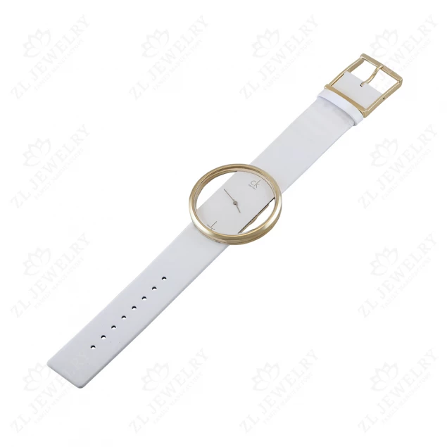 Gold watch on a white strap